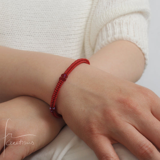 Bracciale Kubik artigianale intrecciato a mano con perline e mezzi Cristalli di Swarovski