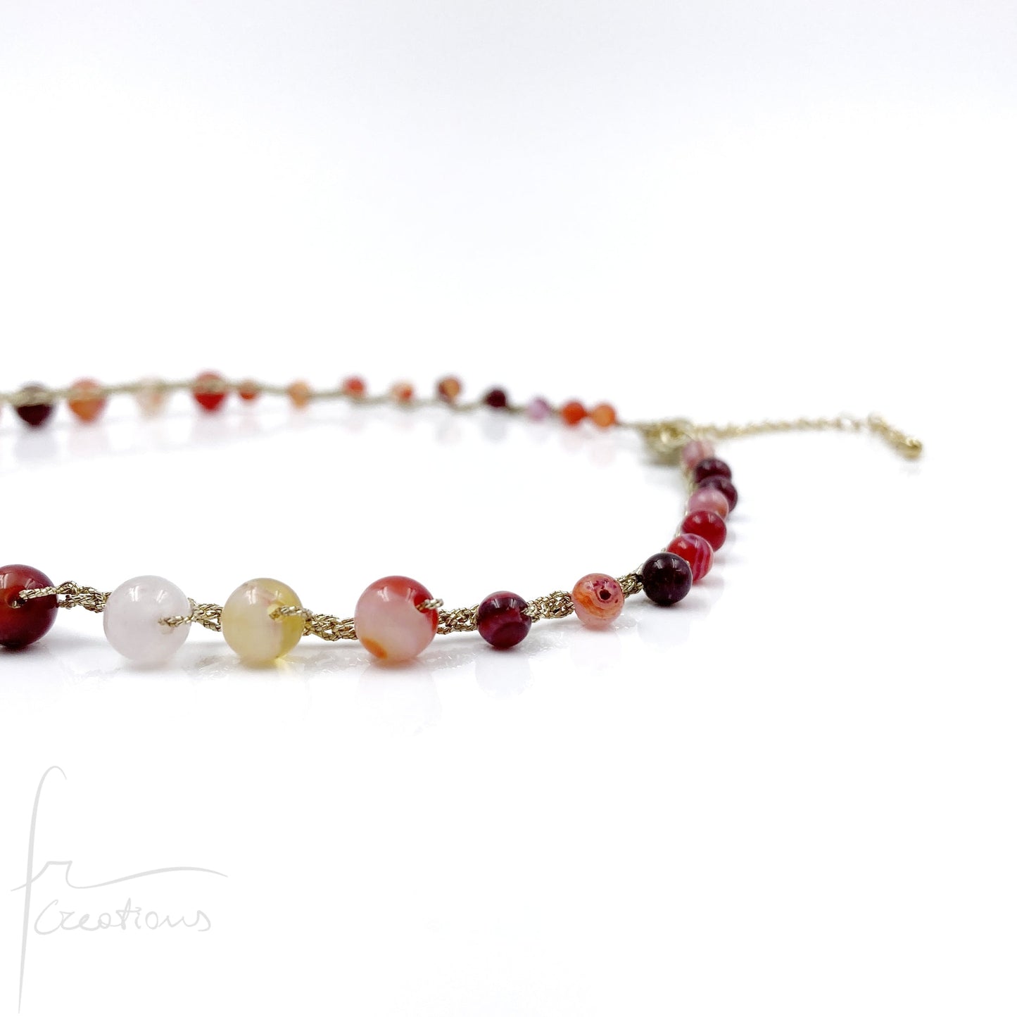 Girocollo Grace all'uncinetto con agata striata rosso ruby