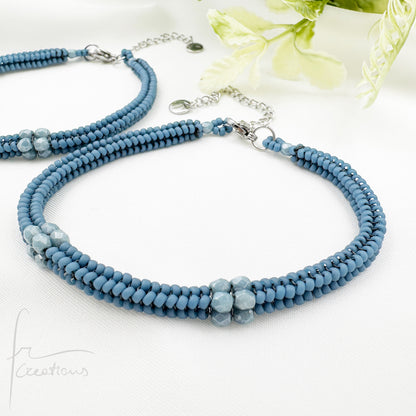 Bracciale Kubik artigianale intrecciato a mano con perline e mezzi Cristalli di Swarovski