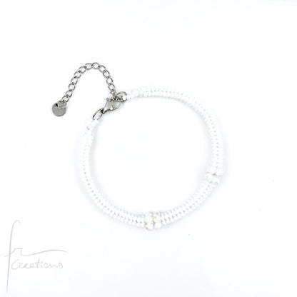 Bracciale Kubik artigianale intrecciato a mano con perline e mezzi Cristalli di Swarovski