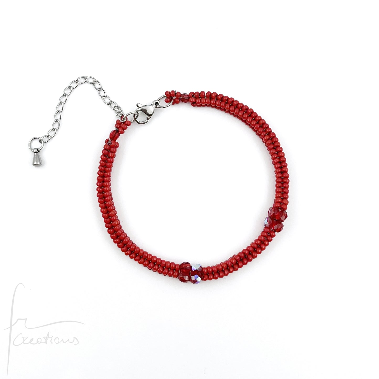 Bracciale Kubik artigianale intrecciato a mano con perline e mezzi Cristalli di Swarovski