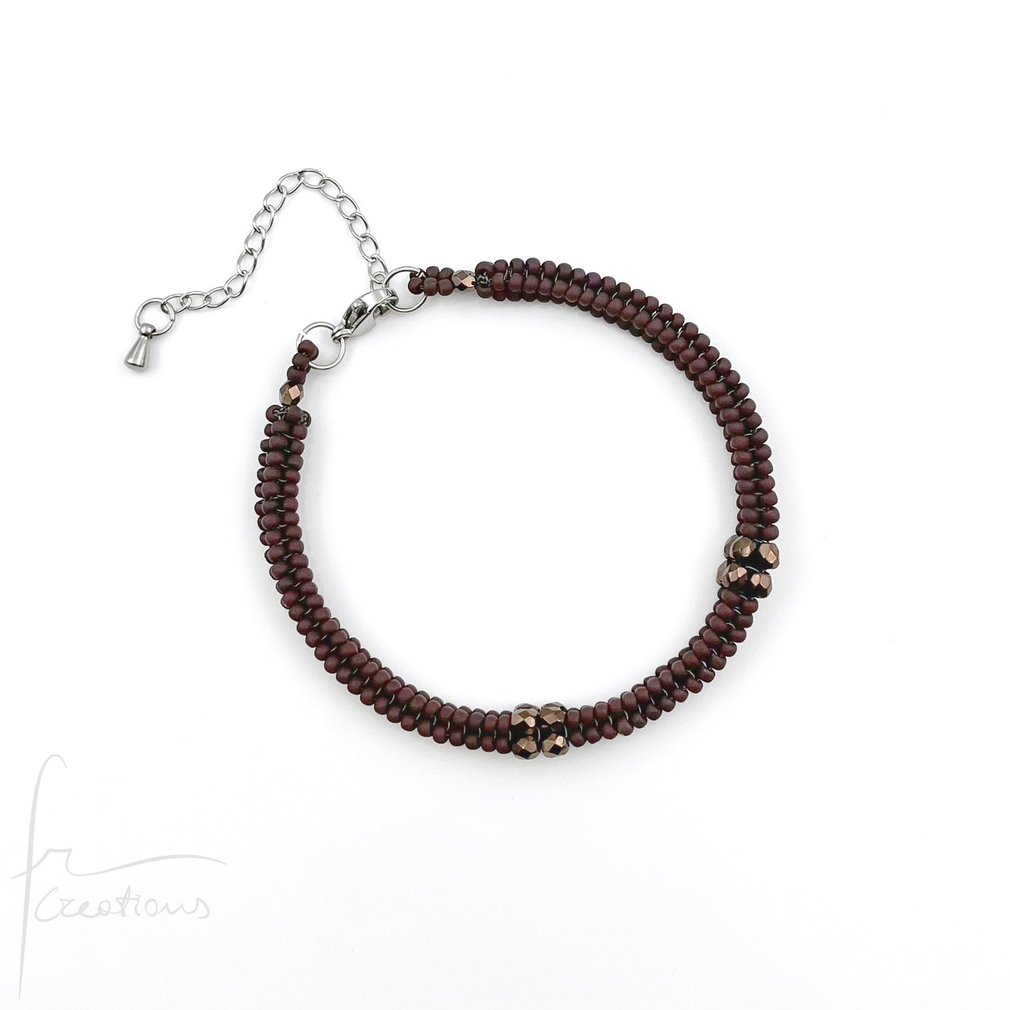 Bracciale Kubik artigianale intrecciato a mano con perline e mezzi Cristalli di Swarovski