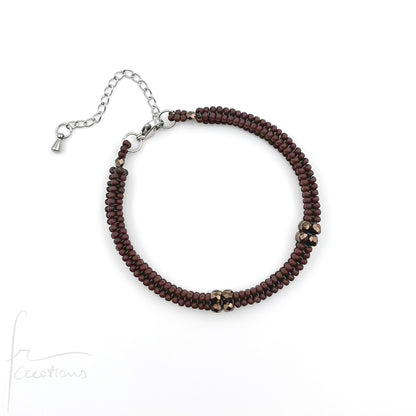 Bracciale Kubik artigianale intrecciato a mano con perline e mezzi Cristalli di Swarovski