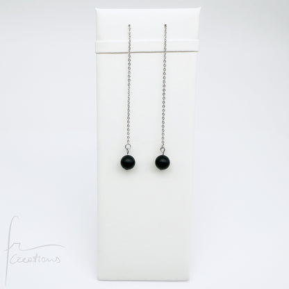 Coppia di orecchini pendenti  saliscendi con onice nero satinato opaco