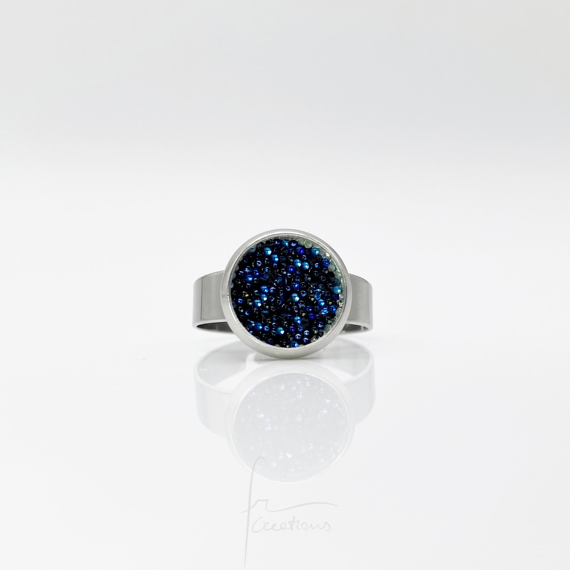 Anello chevalier regolabile in acciaio Cristalli di Swarovski Ocean Blue