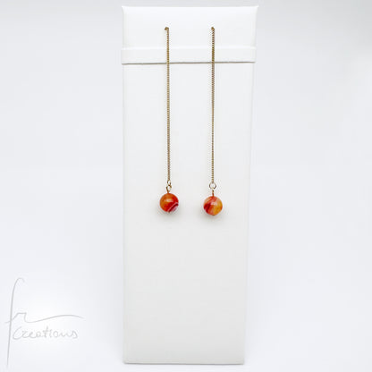 Mono orecchini pendenti  saliscendi con agata striata ruby