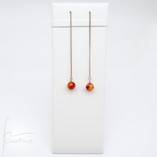 Mono orecchini pendenti  saliscendi con agata striata ruby