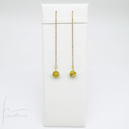 Mono orecchini pendenti  saliscendi con agata striata giallo pomelo