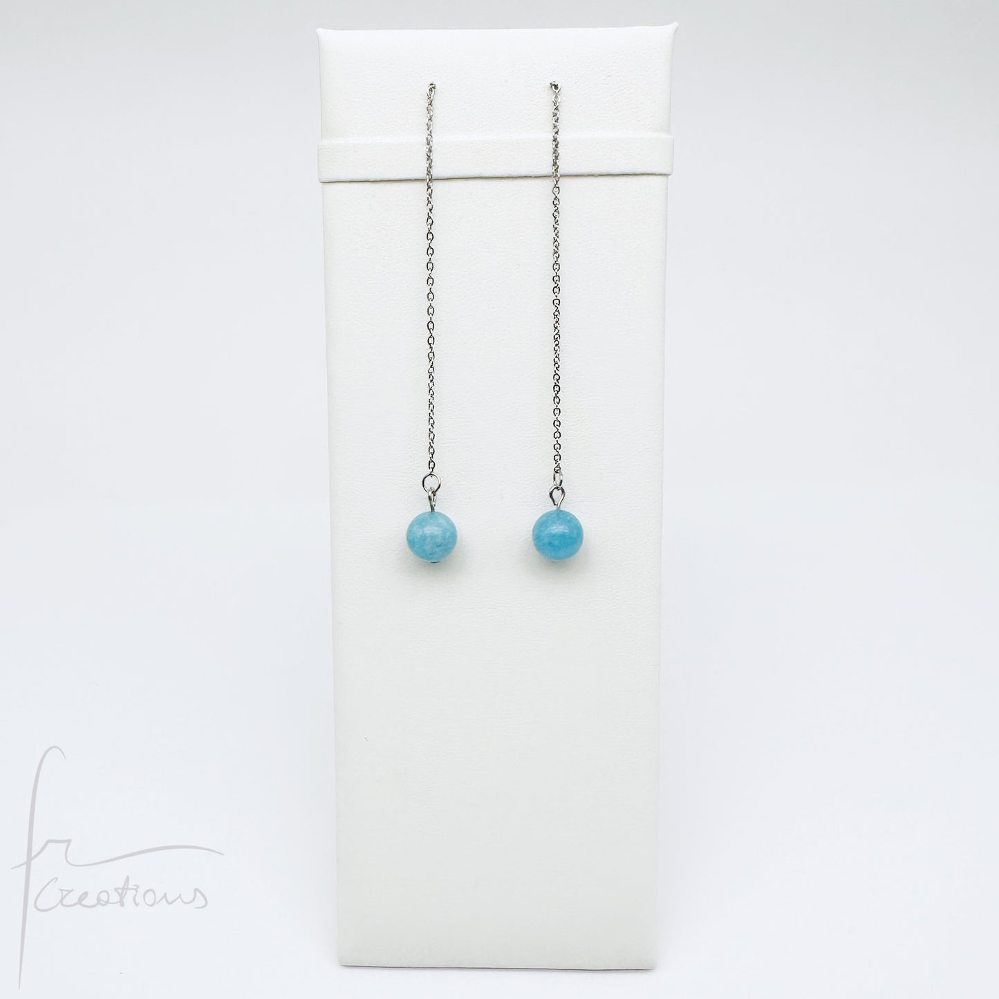 Mono orecchini pendenti  saliscendi con angelite striata azzurro