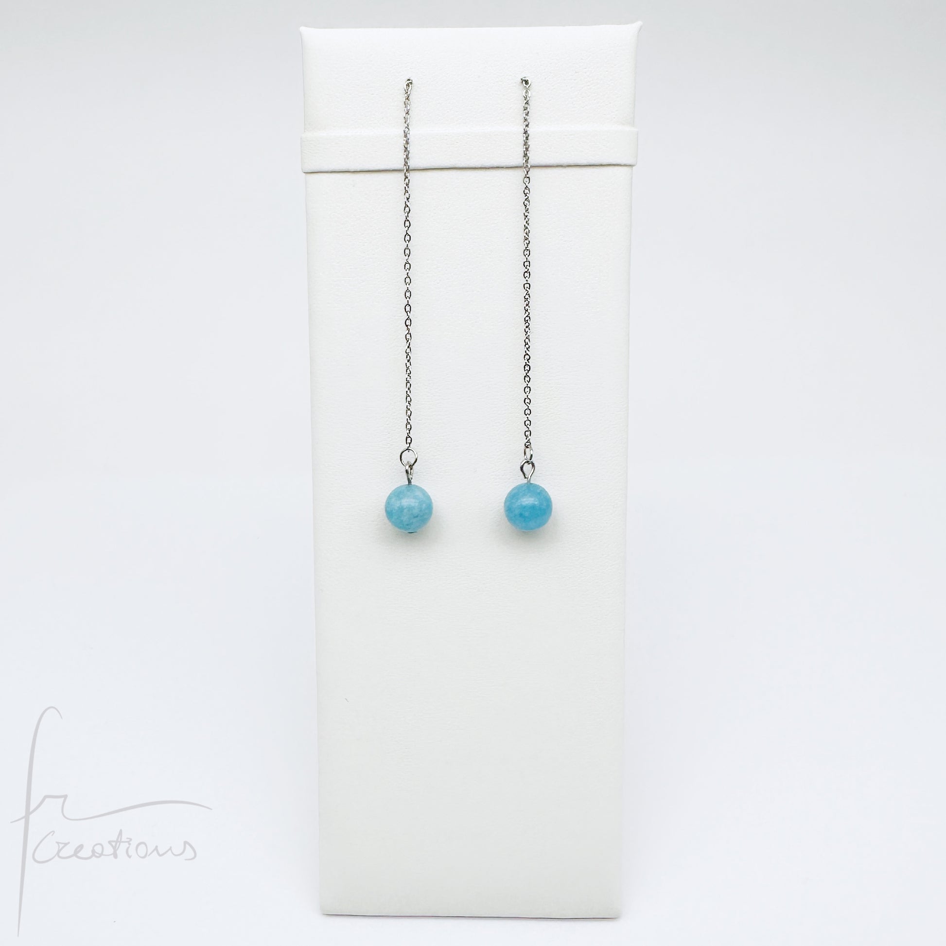 Mono orecchini pendenti  saliscendi con angelite striata azzurro